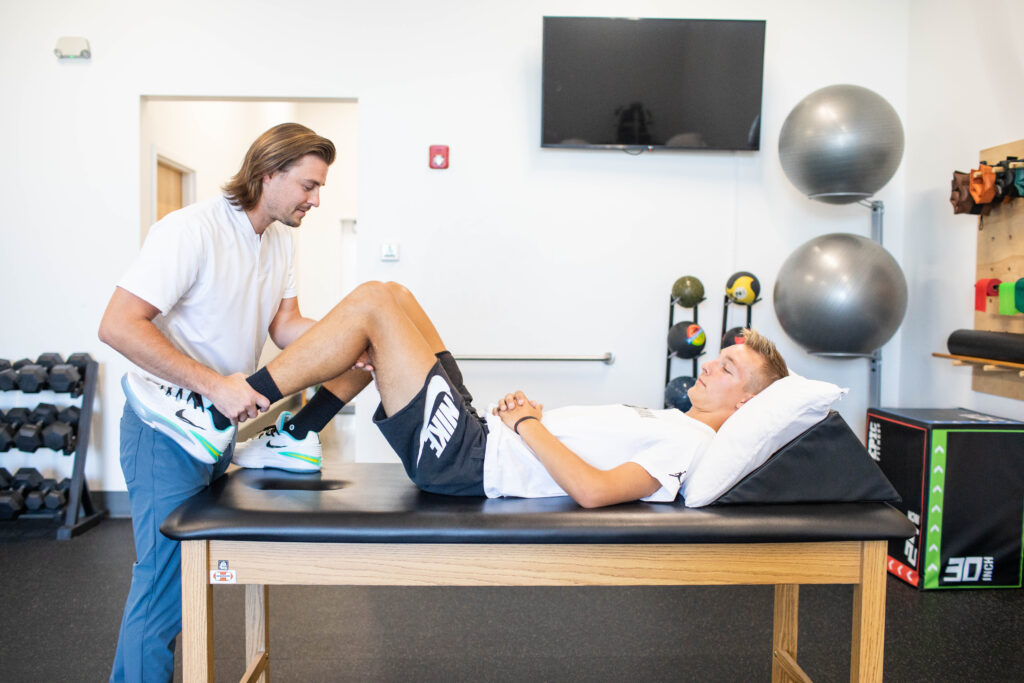 Physical therapist performing treatment at Fortify Physical Therapy.